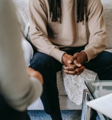 A man speaking with a therapist.
